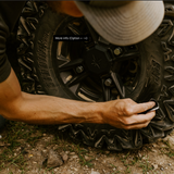 Lightly sanding tire rubber to prepare for GlueTread sidewall patch